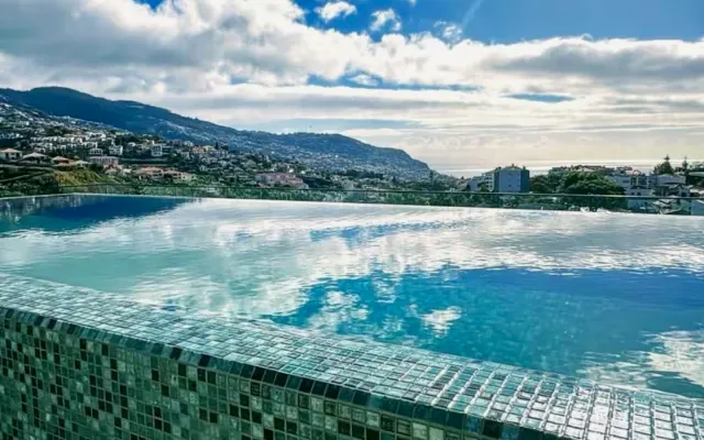 Apartment with a Pool and City View