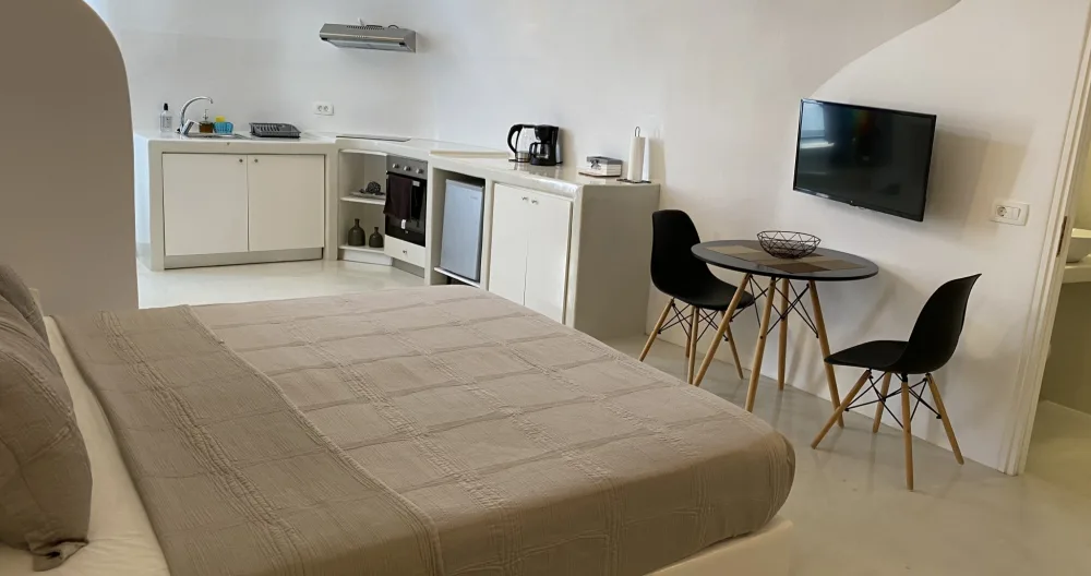 Cally Cave Jacuzzi Suite doppia, piscina in comune, vicino a Fira - Foto 1