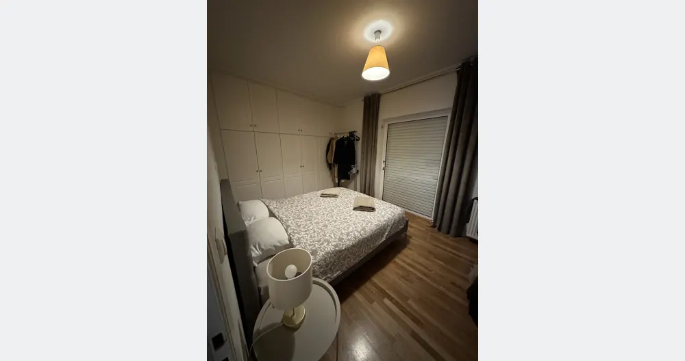 Kristopher's listing on misterb&b - Your bedroom, large double bed, big window doors with shutters and curtains with access to a balcony, bedside table with lamp, and a clothes rail with hangers to hang your stuff. The room has air conditioning and heating. Bedding and towels provided!