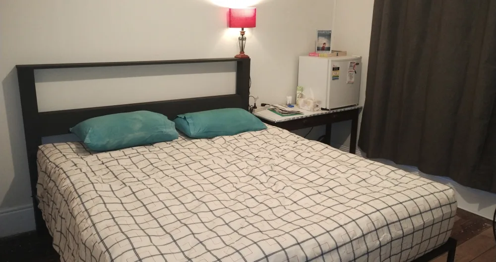Robert's listing on misterb&b - king size bed handmade bedhead small fridge 